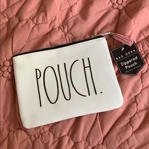 NWT Rae Dunn Pouch with pink tassel